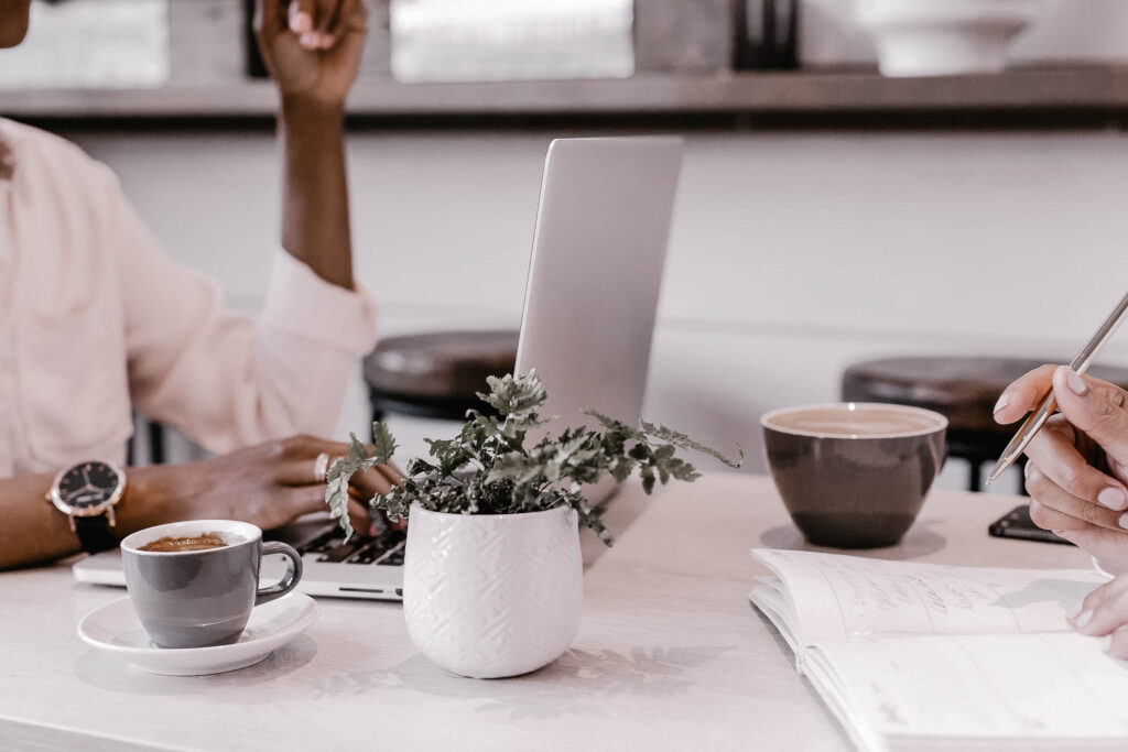 Female Entrepreneurs researching ideal client